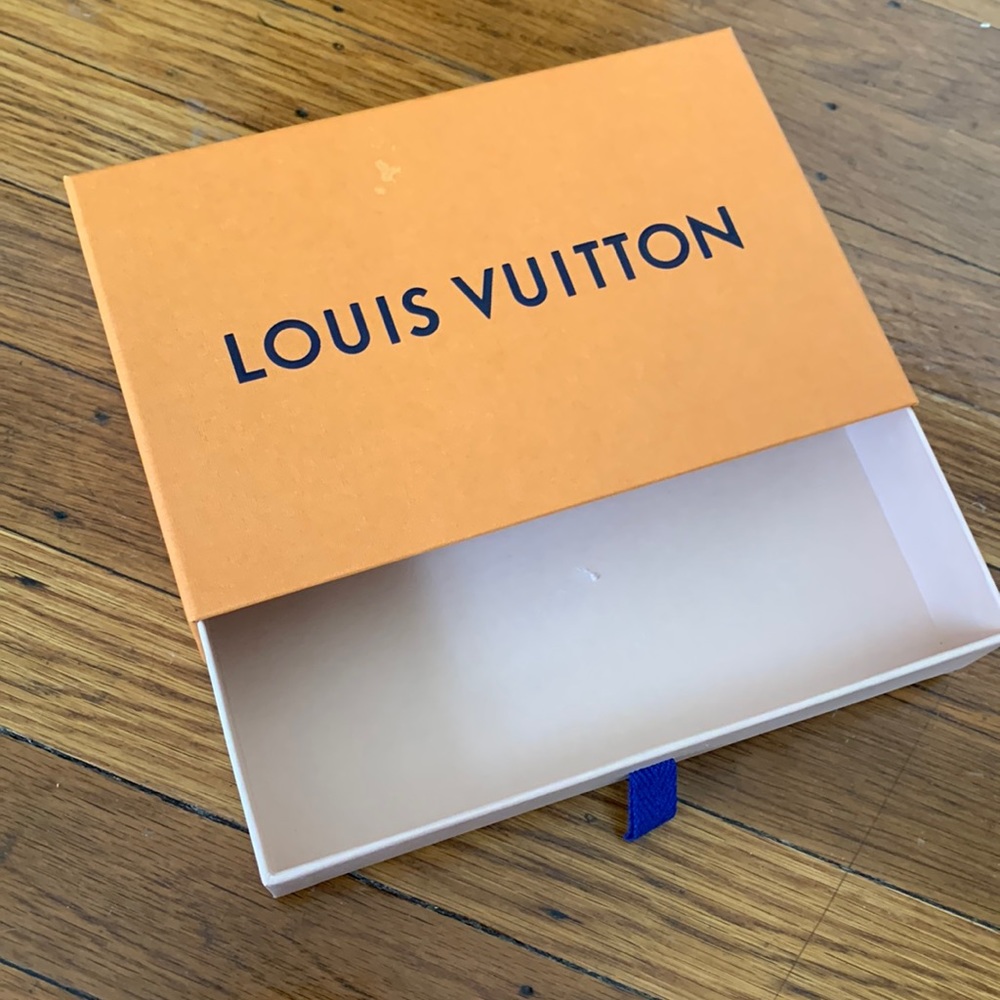 Empty Louis Vuitton gift box and bag